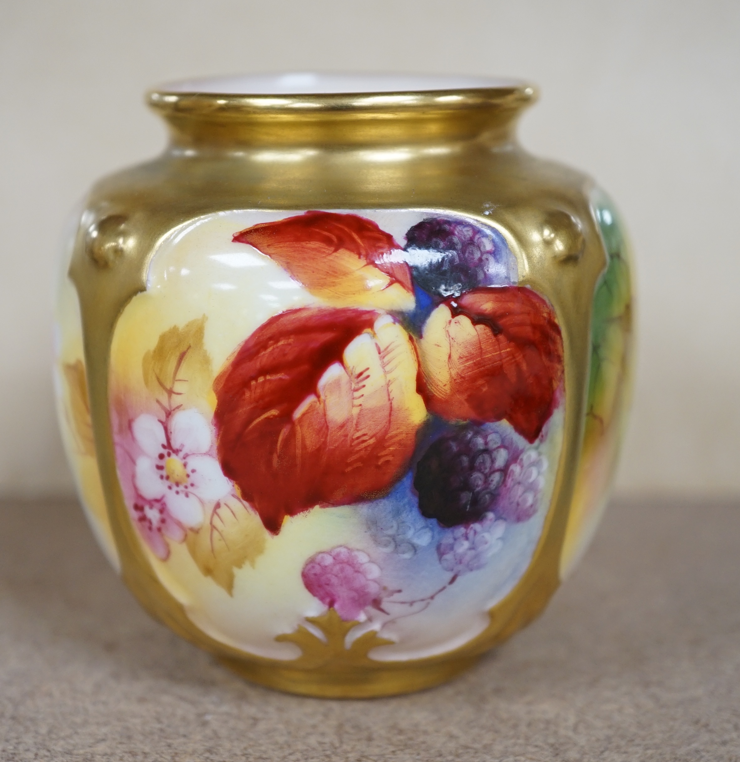 A Royal Worcester ‘Maple’ pot by Kitty Blake, model number 162, 8cm. Condition - good